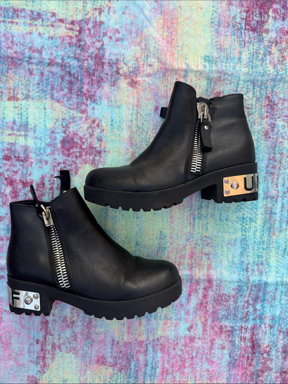 UNIF Black Leather Ankle Boots with Metallic Heel Detail